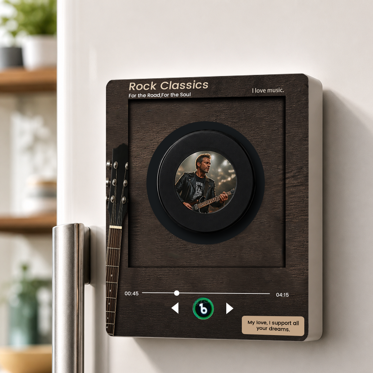 Close-up of a personalized mini vinyl music player with a dark retro-style casing