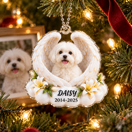 Pet memorial photo ornament with white dog, angel wings, name, and memorial years