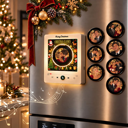 White vinyl-style music fridge magnet beside custom photo discs