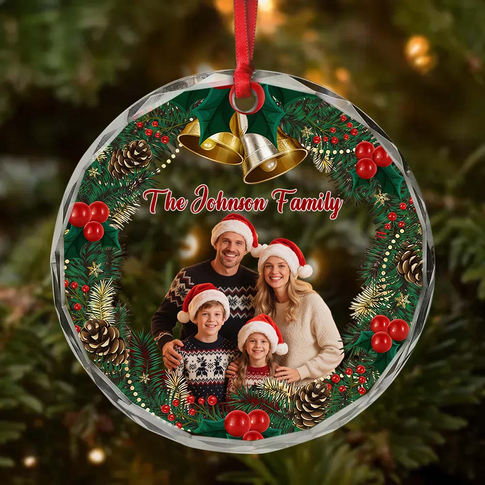 Personalized family portrait ornament hanging among Christmas branches