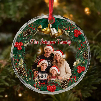 Personalized family portrait ornament hanging among Christmas branches