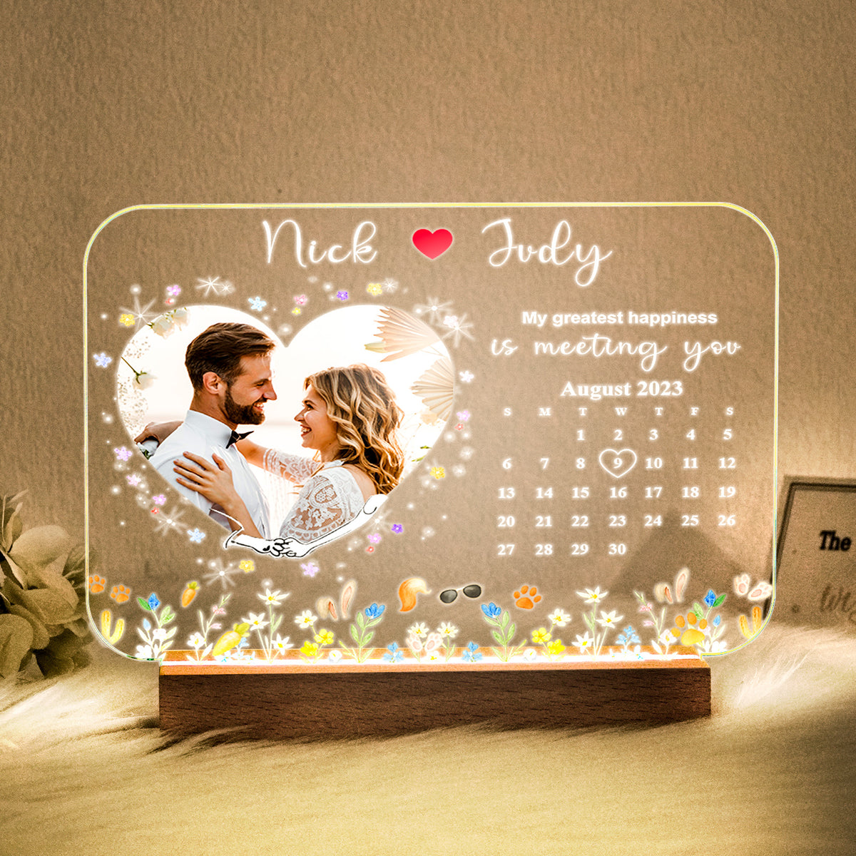 Personalized acrylic LED night light with couple photo, names, calendar date, and wooden base