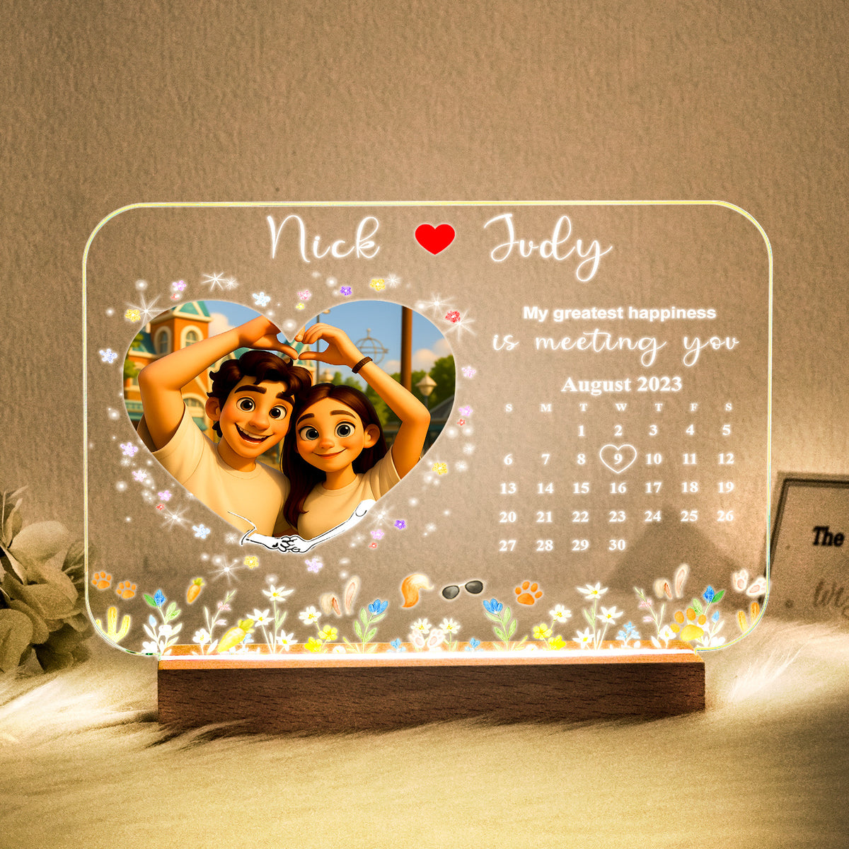 Cartoon-style couple portrait on a personalized LED photo night light with wooden base