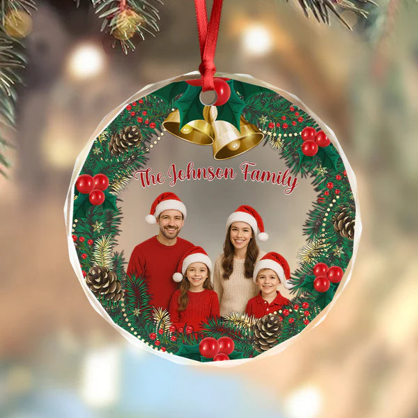 Round family photo Christmas ornament with wreath design and red ribbon