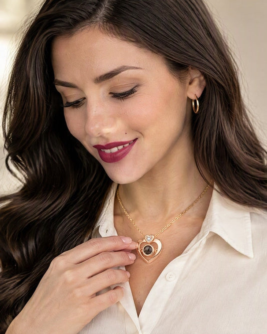 Woman wearing the Wakera double heart photo projection necklace